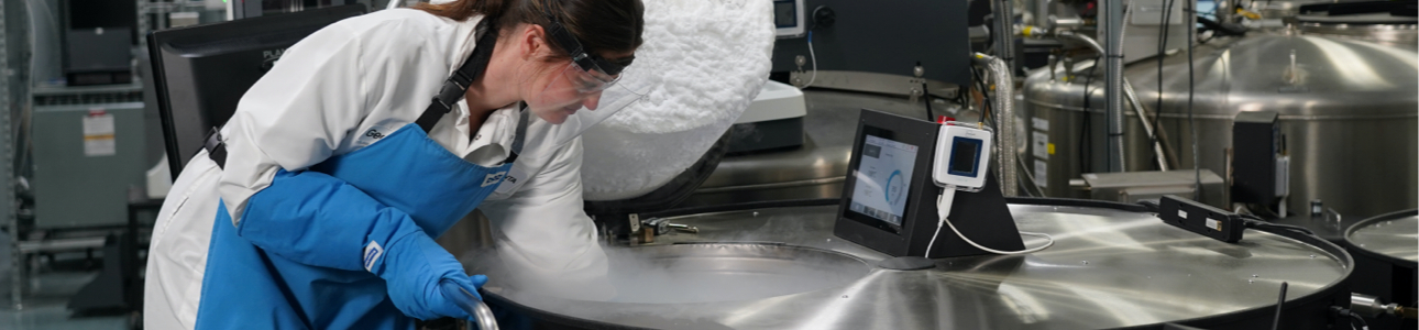 Lab technician inspecting an LN2 tank