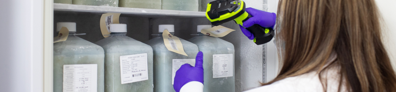 Lab staff scanning container in cryo storage